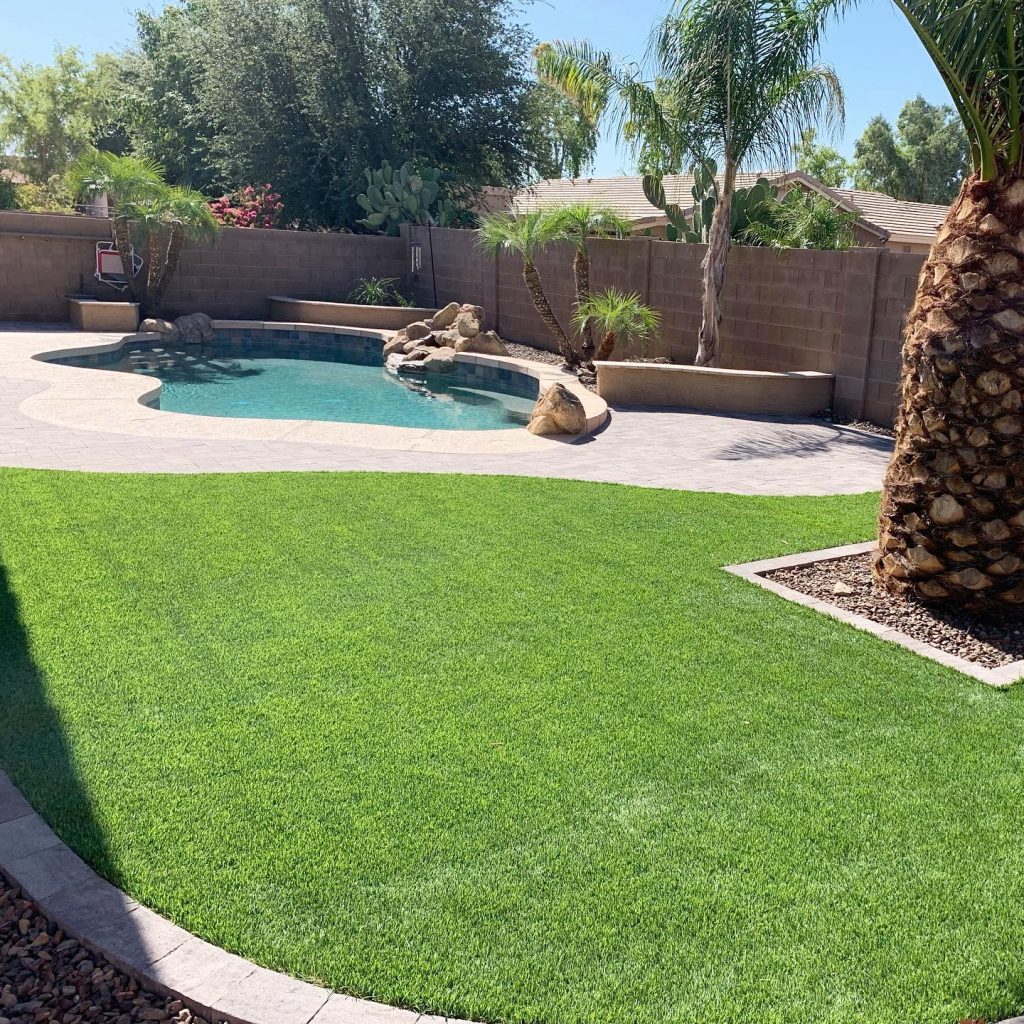 after image of artificial turf installation in a landscaped yard in the east valley