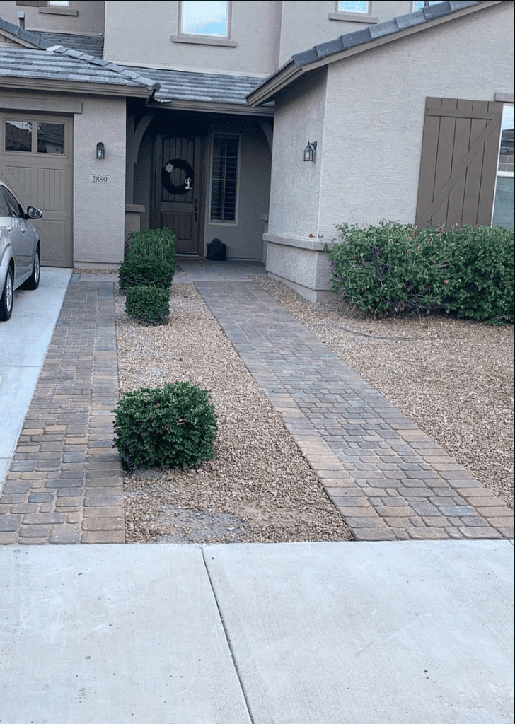 after image of a completed paver driveway extension and walkway