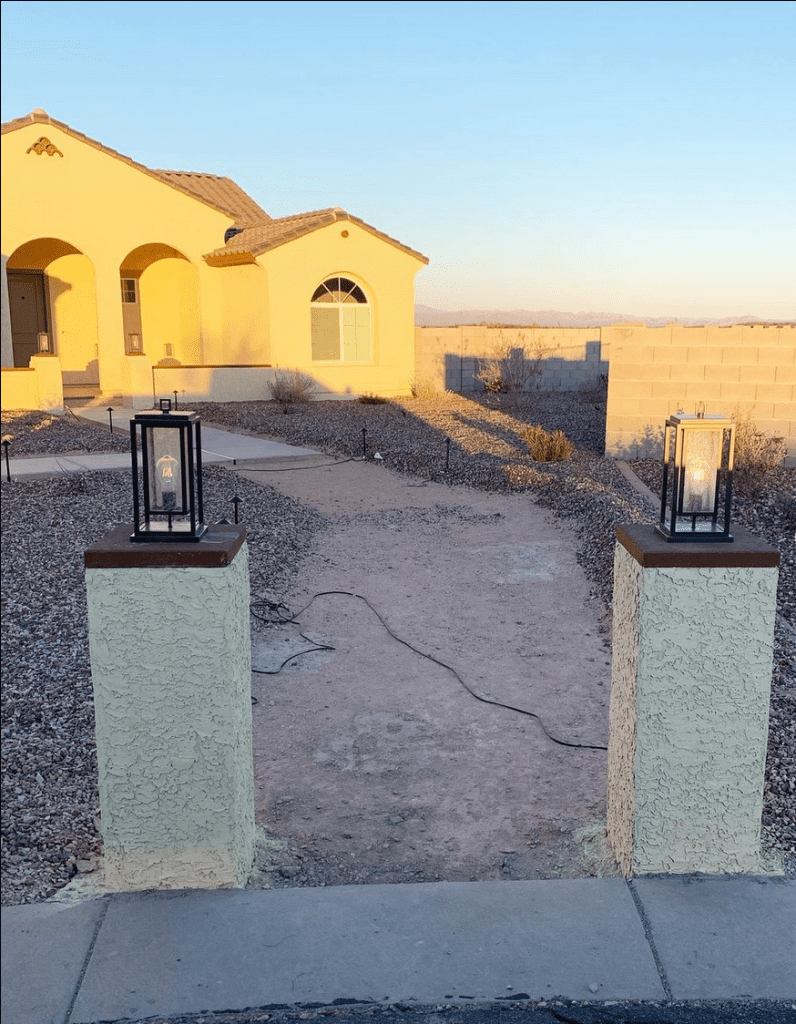 a dirt path connecting the street to a front door