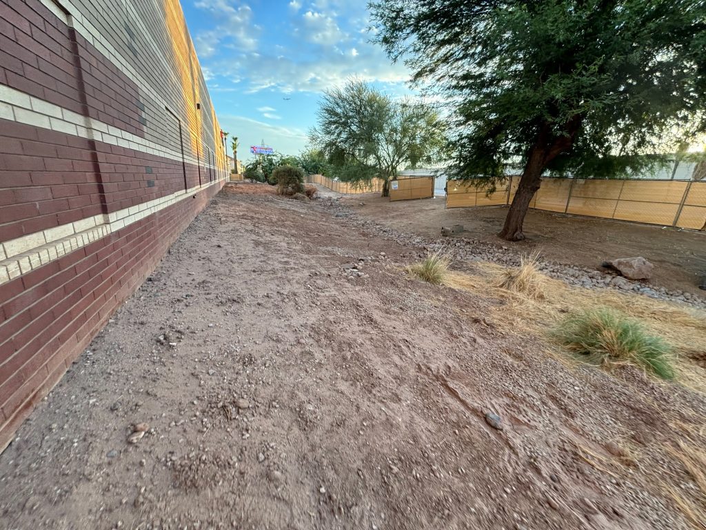 before shot of a commercial dirt easement with no dust or weed control